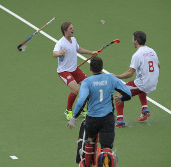 Ashley-Jackson-Simon-Mantell-and-George-Pinner-celebrate-winning-bronze-against-New-Zealand-at-Glasgow-2014-Commonwealth-Games-credit-Ady-Kerry