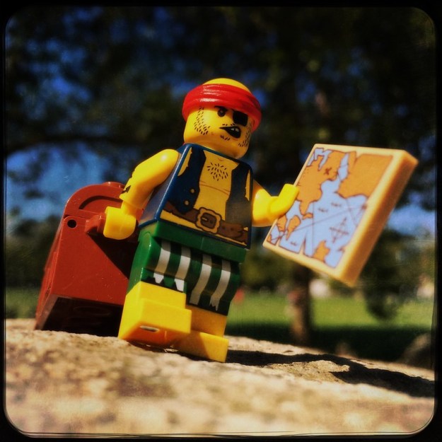 Lego man burying treasure